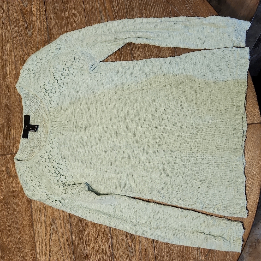 Teal sweater with lace flowers